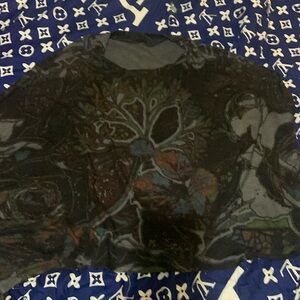 Woman’s throw. Great design in good condition. One size fits all